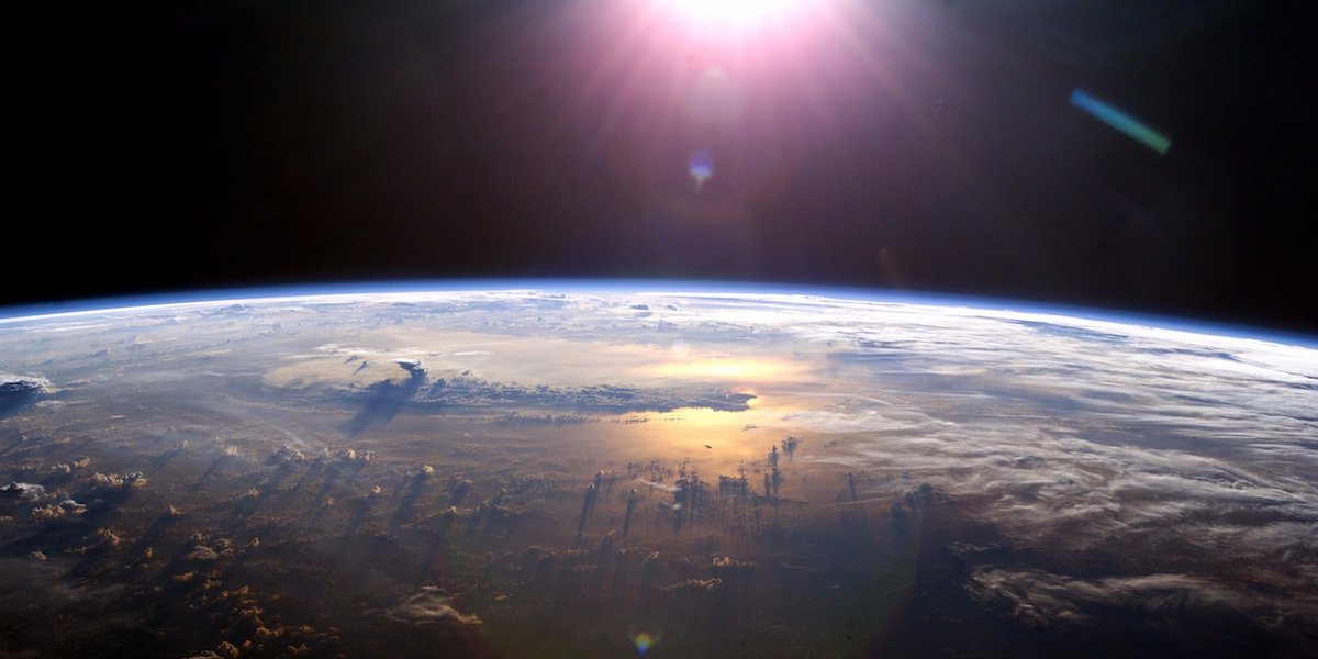 sun above curvature of earth